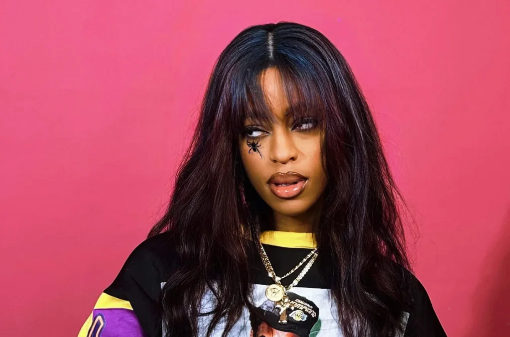 Get To Know Qing Madi: A Gen Z Artist Making Waves in the Music Industry